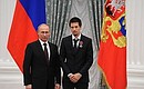 Presenting Russian Federation state decorations. The Order of Courage is awarded to Russia Today TV freelance reporter Fedor Zavaleykov.