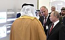 President of Russia Vladimir Putin and Crown Prince of Abu Dhabi and Deputy Supreme Commander of the UAE Armed Forces Mohammed bin Zayed Al Nahyan visit an exhibition of investment projects. Russian Direct Investment Fund CEO Kirill Dmitriev gives explanations.
