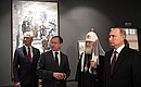 Vladimir Putin toured the exhibition Memory of Generations: The Great Patriotic War in Pictorial Arts, which opened at the Manezh Central Exhibition Hall as part of the Church and Public Exhibition and Forum Orthodox Russia – For National Unity Day. With Patriarch Kirill of Moscow and All Russia, Minister of Culture Vladimir Medinsky and Mayor of Moscow Sergei Sobyanin.