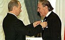 President Putin presenting the Order of Honour to Eduard von Falz Fein from Liechtenstein at an awards ceremony.