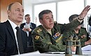 Vladimir Putin watched the final phase of large-scale military exercises involving Eastern and Central Military District forces.
