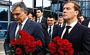 Laying flowers at the impromptu shrine to commemorate the Yak-42 plane crash victims. With President of Turkey Abdullah Gul.
