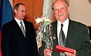 A ceremony of presenting the 1999 State Prizes of Russia in science and technology. Valentin Vorontsov, PhD in Agricultural Science, leading scientist of the Russian Scientific Research Institute of Floriculture and Subtropical Cultures under the Russian Academy of Agriculture, received a golden plaque and prize winner diploma.
