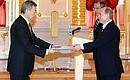 Ceremony for the presentation of foreign ambassadors\' letters of credentials. Ambassador of the Republic of Kazakhstan Nurtai Abykaev presents his letter of credentials. In the background is Russian Foreign Minister Sergei Lavrov.