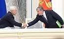 Before the meeting of the Commission for Strategic Development of the Fuel and Energy Sector and Environmental Safety. Presidential Aide Andrei Belousov and Rosneft CEO Igor Sechin.