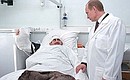 President Putin visiting the Burdenko military hospital.