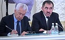 Acting Head of the Republic of Daghestan Vladimir Vasilyev (left) and Head of Ingushetia Yunus-Bek Yevkurov at the State Council meeting on priority areas of the Russian regions’ activity to promote competition in the country.