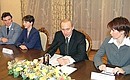 President Vladimir Putin meeting with Russian Olympic team athletes and trainers.