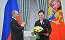Test cosmonaut of the Gagarin Research and Test Cosmonaut Training Centre Yelena Serova is awarded the title of Hero of the Russian Federation and Pilot-Cosmonaut of the Russian Federation.