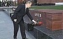 President Putin laying flowers at the markers honouring Hero Cities near the Kremlin Wall.