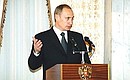 President Vladimir Putin addressing US political and community activists and businesspeople.