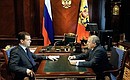 With President of Rosneft Eduard Khudainatov.