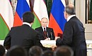 Signing Russia-Uzbekistan documents. Photo: Pavel Bednyakov, RIA Novosti