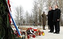 Laying wreaths at the monument marking the site of the plane crash on April 10, 2010. With President of Poland Bronislaw Komorowski.