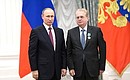 Presentation of state decorations. Mikhail Piotrovsky, director of the State Hermitage Museum, is awarded the Order of Friendship.