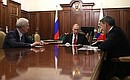 Working meeting with Presidential Aide Andrei Fursenko (left) and director of the Russian Science Fund Alexander Khlunov.
