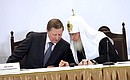 Chief of Staff of the Presidential Executive Office Sergei Ivanov and Patriarch of Moscow and All Russia Kirill at a gala event to mark the 70th anniversary of the founding of the Moscow Patriarchate’s Department for External Church Relations.