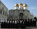 Перед началом торжественного приема по случаю восстановления единства Русской православной церкви.