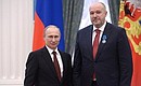 Presenting Russian Federation state decorations. CEO of the Sports Broadcasting (Panorama) TV production company Vasily Kiknadze is awarded the Order of Honour.