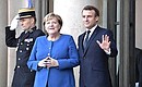 Federal Chancellor of the Federal Republic of Germany Angela and President of France Emmanuel Macron before the Normandy format meeting.