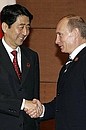 С Премьер-министром Японии Синдзо Абэ.