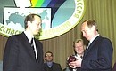 Presentation of a certificate on the election of Vladimir Putin as President of the Russian Federation. Vladimir Putin with Alexander Veshnyakov, chairman of the Central Election Commission.