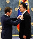 Presenting Russian state decorations to foreign citizens. Tikara Kishimoto, a teacher at Musasino Conservatory in Tokyo Prefecture, receives the Pushkin Medal.