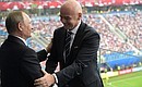 With FIFA President Gianni Infantino at the opening match of the 2017 Confederations Cup.