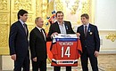 Alexander Ovechkin, captain of the Russian national team, gave Vladimir Putin a T-shirt signed by the players.