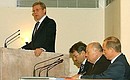 President Vladimir Putin at a joint meeting of the boards of the Finance Ministry and the Economic Development and Trade Ministry. From left to right: Finance Minister Alexei Kudrin, Economic Development and Trade Minister German Gref, Prime Minister Mikhail Fradkov, and President Vladimir Putin.