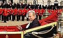 Vladimir Putin and Her Majesty Queen Elizabeth II shared a carriage from Horse Guards Parade to Buckingham Palace.