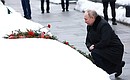 During a visit to the Piskarevskoye Memorial Cemetery Vladimir Putin honoured the memory of his brother who died during the siege of Leningrad. Photo: Vyacheslav Prokofyev, TASS
