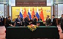 Signing of documents following Russian-Chinese talks.