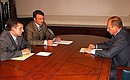 С Председателем правления Пенсионного фонда Михаилом Зурабовым (крайний слева) и Министром экономического развития и торговли Германом Грефом.