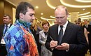 After the reception, Vladimir Putin spoke with volunteer Ivan Radko, who spent two working days with the President. Mr Radko asked the President for this chance during Mr Putin’s meeting with 2014 Olympic volunteers on January 17.