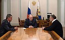 Working meeting with Acting Governor of Sevastopol Alexei Chaly and former deputy commander of the Black Sea Fleet and reserve Vice- Admiral Sergei Menyailo.