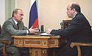 President Putin with Foreign Minister Igor Ivanov.