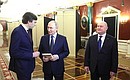 Ahead of the State Council meeting with Minister of Education Sergei Kravtsov (left) and Governor of Sevastopol, Chairman of the State Council Commission on Education Mikhail Razvozhayev.