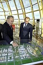 President Putin and Kazakh President Nursultan Nazarbayev looking at a model of the new administrative centre, which is now under construction.