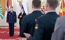 Meeting with service personnel who took part in the anti-terrorist operation in Syria. Major Maxim Makolkin was awarded the Order of Courage.