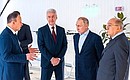 With Moscow Mayor Sergei Sobyanin (centre) and Moscow State University Rector Viktor Sadovnichy (right) during a tour of the Lomonosov cluster project for unmanned aerial systems. Amir Valiyev, Ptero general director, gives explanations. Photo: Press Office of Moscow Mayor