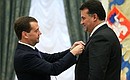 Ceremony for presenting state decorations. Alexander Pleshakov, CEO of Transaero Airlines, received the Order of Honour.