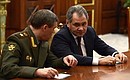 Defence Minister Sergei Shoigu (right) and Chief of the General Staff Valery Gerasimov at meeting on investigation into the crash of a Russian airliner over Sinai.