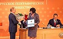 XV congress of the Russian Geographical Society. Tatyana Kalikhman, who works at the Geography Institute of the Russian Academy of Sciences’ Siberian Division, was awarded the Ivan Borodin Gold Medal. Photo: Ilya Melnikov, Russian Geographical Society