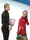 Yevgeny Plyushchenko and Yulia Lipnitskaya won gold medals in the figure skating team skating competition.