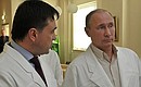 During a visit to a hospital of the Mat i Ditya [Mother and Child, MD Medical Group] private clinic chain. With Acting Governor of the Moscow Region Andrei Vorobyov.