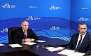 During a meeting with Eastern Economic Forum moderators (via videoconference). With Deputy Prime Minister – Presidential Plenipotentiary Envoy to the Far Eastern Federal District Yury Trutnev.