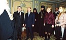 President Putin and his wife Lyudmila with German Federal Chancellor Gerhard Schroeder and his wife Doris Schroeder-Koepf taking a tour of the Holy Trinity Monastery of St Sergius.