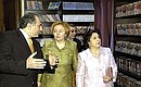 At the Armenian Society for Cultural Ties and Cooperation with Foreign Countries. Chairman of the Russian Federation Council Committee for Economic Policy, Business and Property Oganes Oganian, President Putin\'s wife Lyudmila and Armenian President Kocharian\'s wife Bella during the opening of the Russian Book Centre.