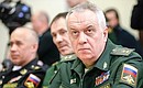 First Deputy Chief of the Main Operations Directorate of the General Staff of the Armed Forces Viktor Poznikher before the meeting with Defence Ministry leadership and defence industry heads. Photo: TASS